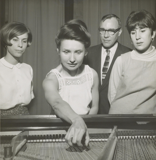 Lucia Dlugoszewski demonstrates the Timbre Piano to students of Cedar Crest College, Allentown, PA, April 1967. Photographer unknown. From the Erick Hawkins and Lucia Dlugoszewski Papers, Music Divisi